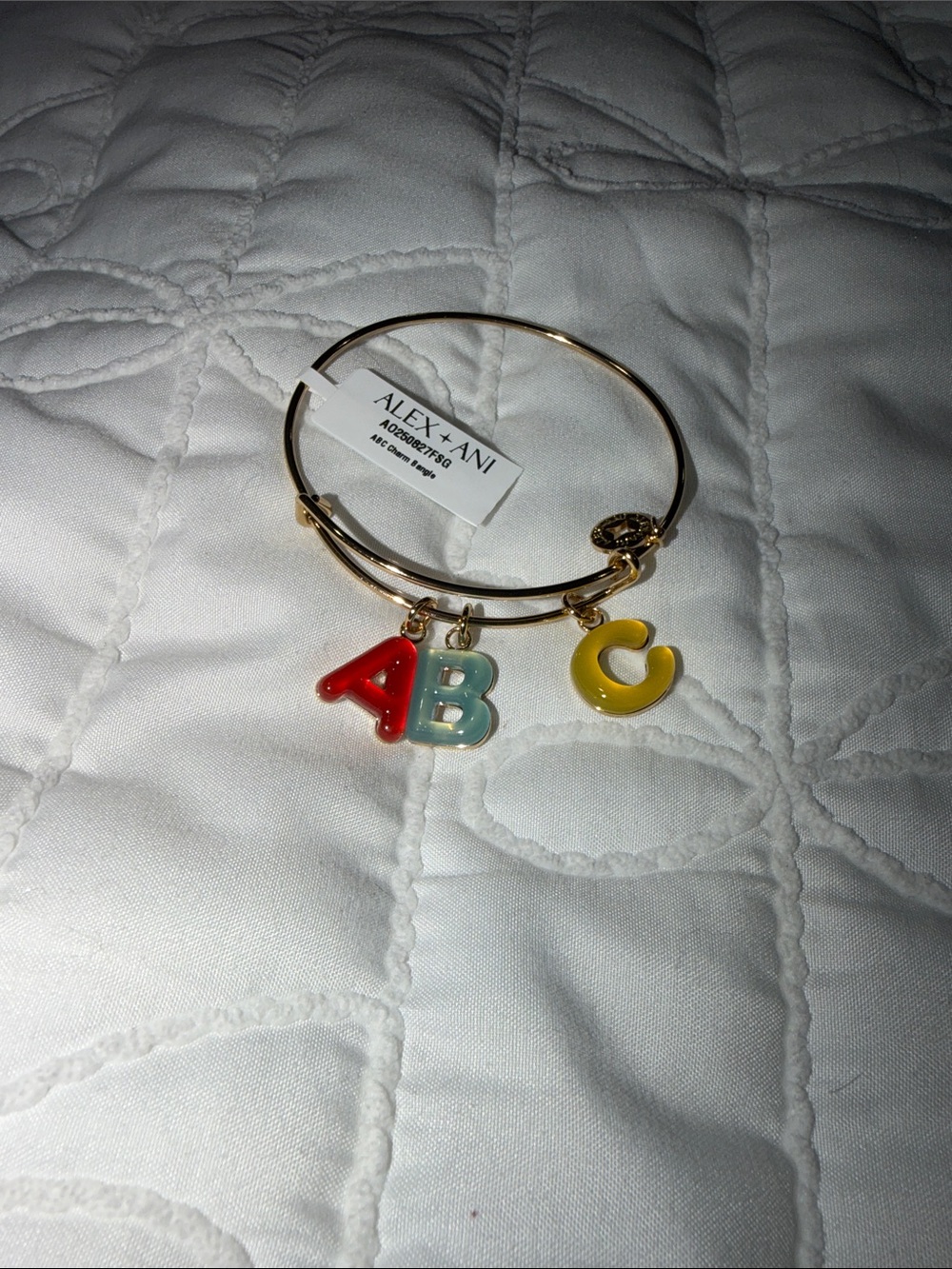 Alex and Ani Gold Bracelet with Red, Teal and Yellow Letter Charms